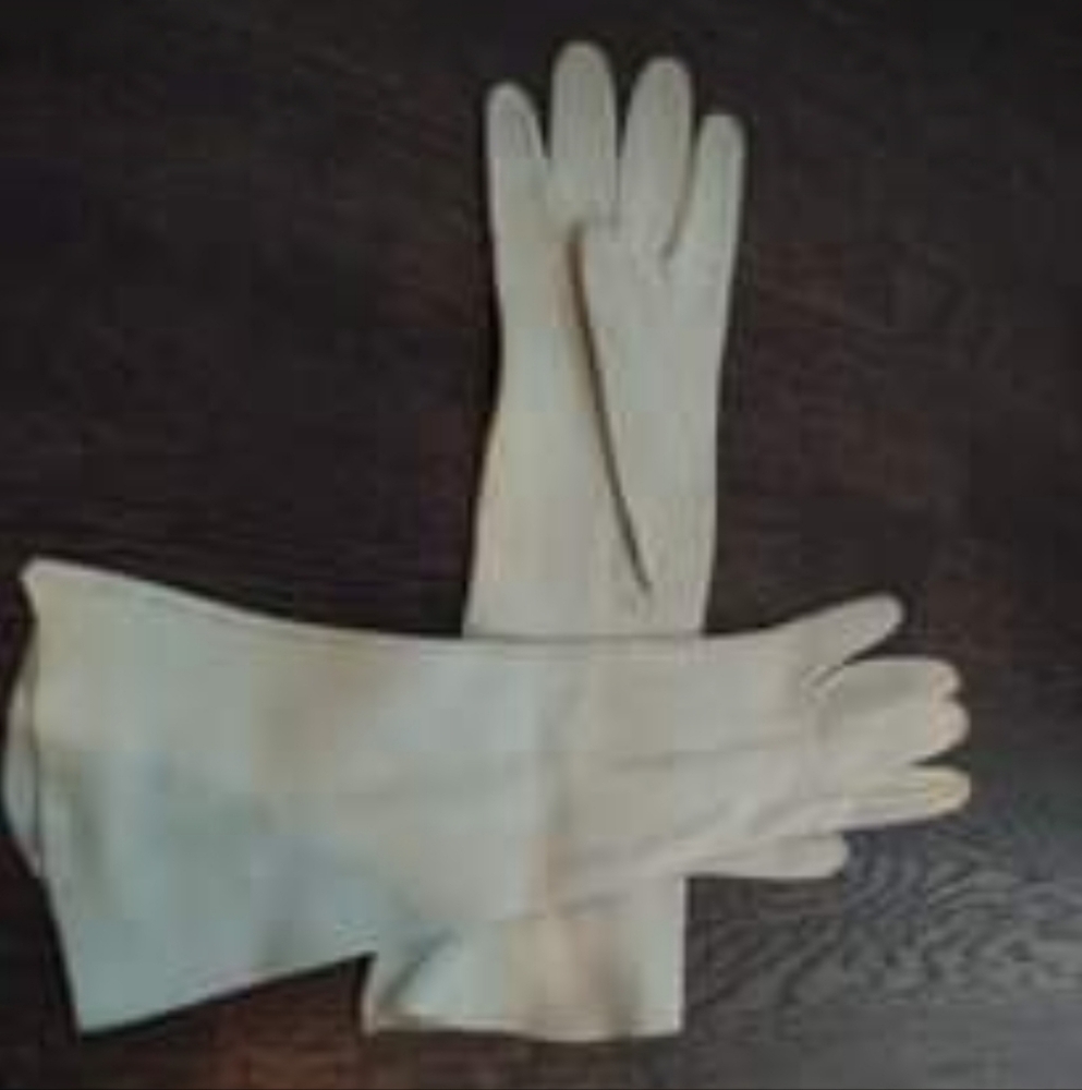 White leather gloves